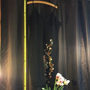 Sexy black cocktail dress with delicate stitching